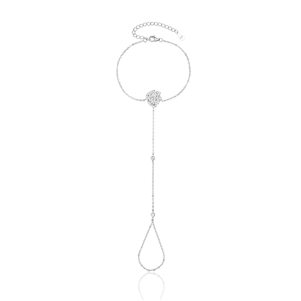 צמיד משולב טבעת משולב אבני זרקון
Silver bracelet with a unique design on a white background
